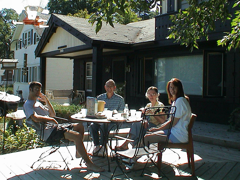 Dan, Dad, Mom and Tammy enjoy breakfast out on the patio.