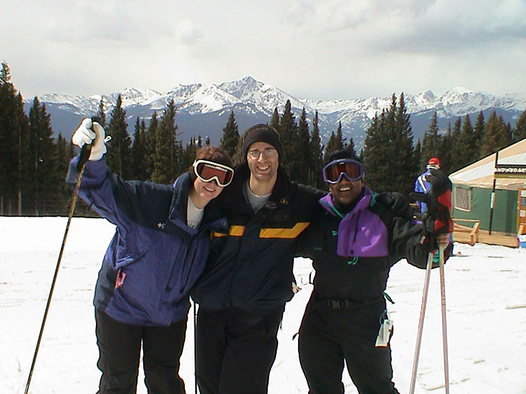 Tammy, Dan, and the old Telcordia friend take a picture to make a poster.