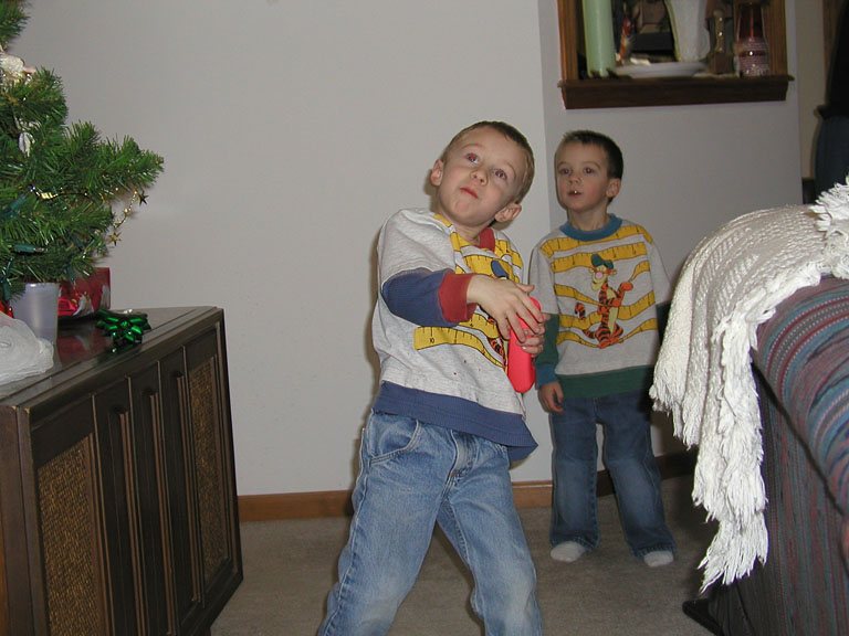 Joel and Todd throw random things around the living room.