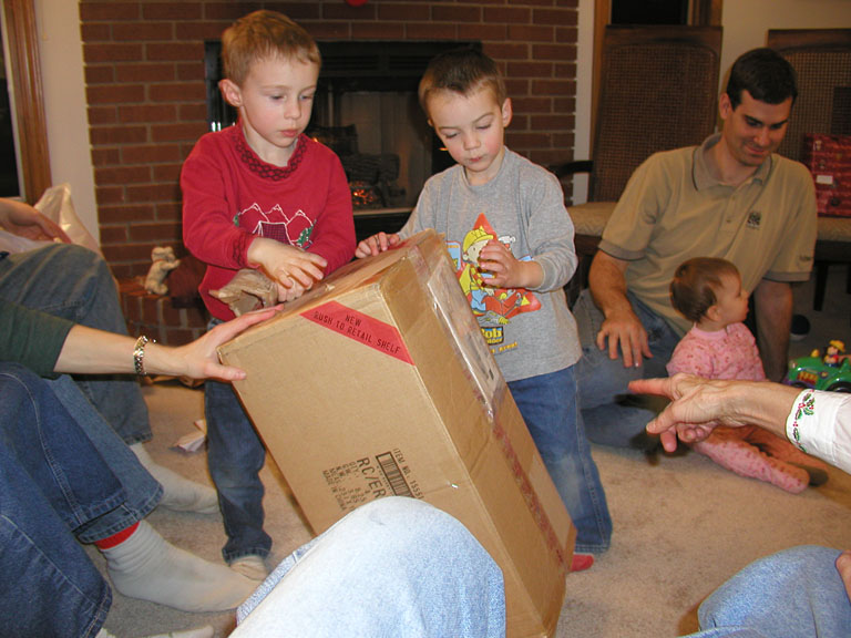 Joel and Todd get ready to tear into the big box.