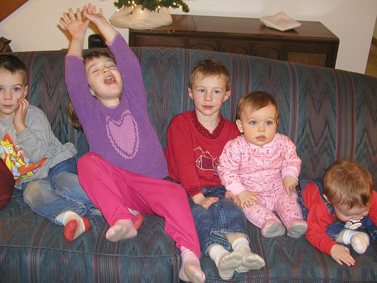 Todd, Madeline, Joel, Sarah and Seth focus on their picture moment.