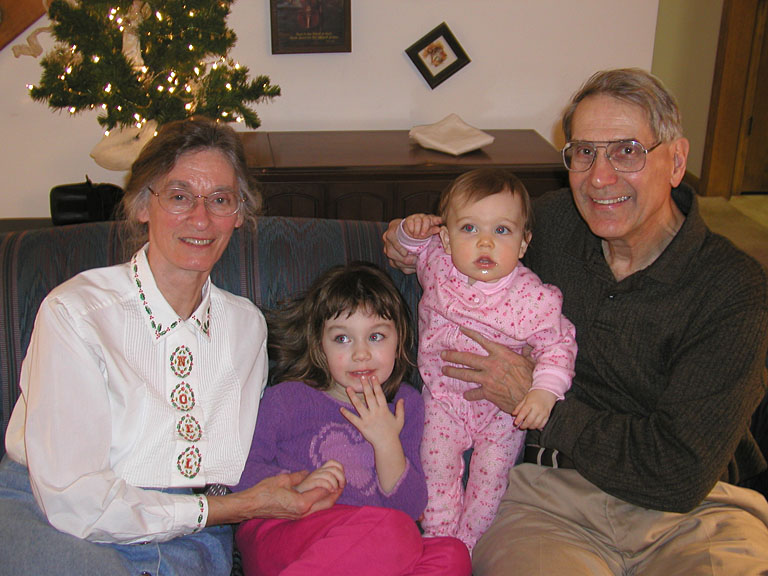 Mom and Dad with their granddaughters Madeline and Sarah.