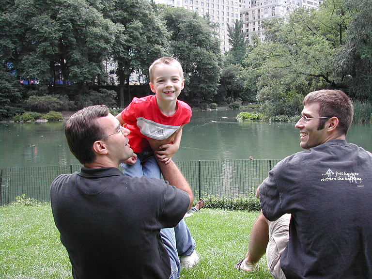 Alan, Todd, and Dan watch the ducks in the lake.