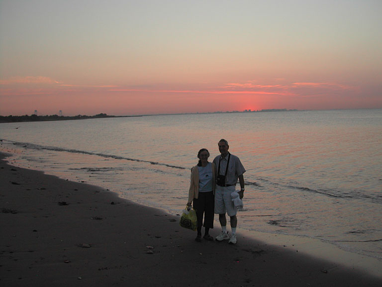 Mom and Dad went out to the beach to watch the sun rise.