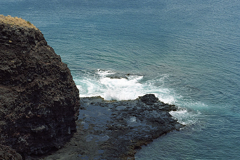 Waves crashing in on the crash site. A car plummeted about 70ft to the rocks below, killing all three passengers. The car was still there, but I didn't feel right actually taking a picture of the car itself.