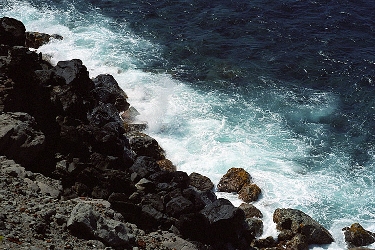 Water surging on the rocks.