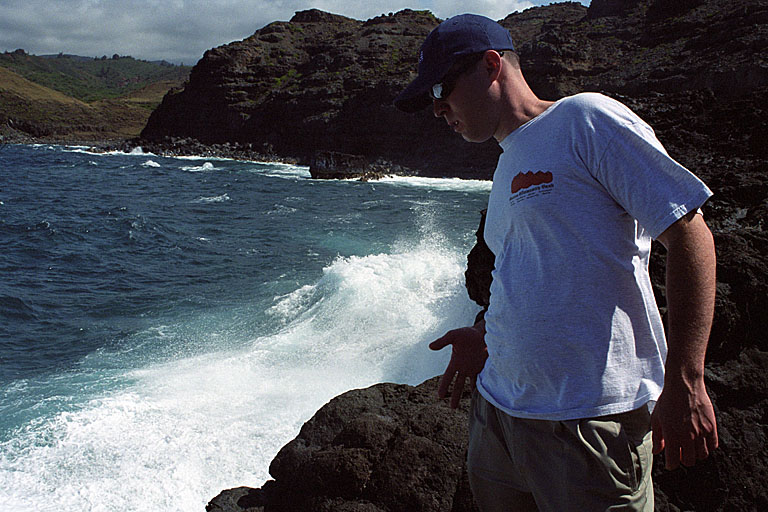 Chad throwing rocks at the crab.