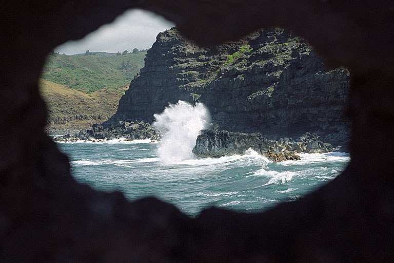Artistic shot of crashing waves.