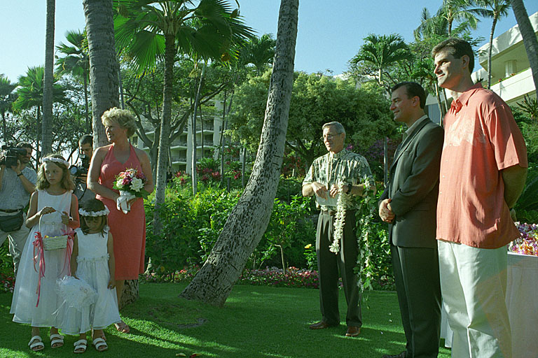The wedding party awaits the bride.