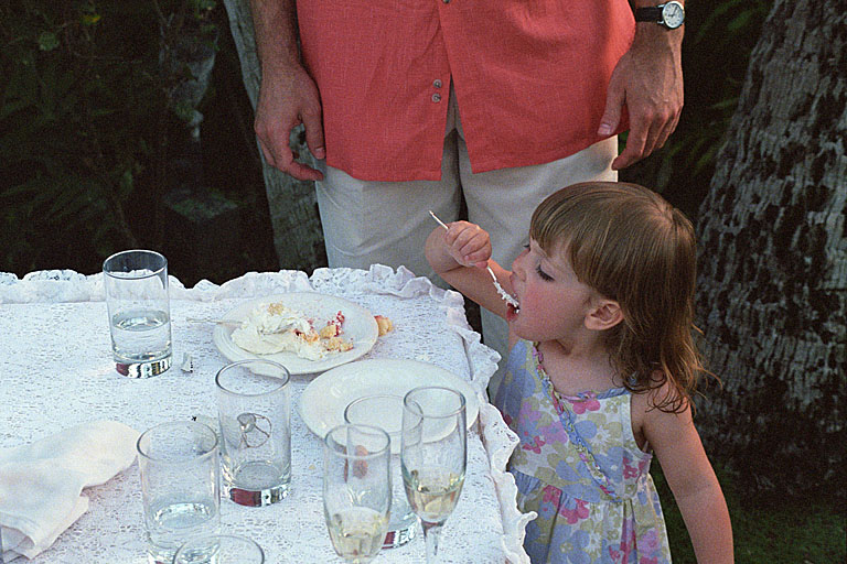 Sarah helps herself to wome wedding cake.