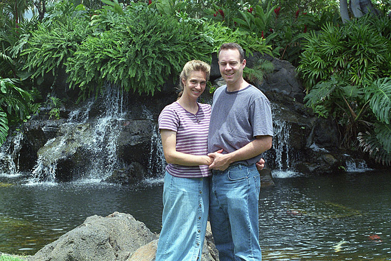 Laurie and Chad in front of the coi pond at the Mariott.