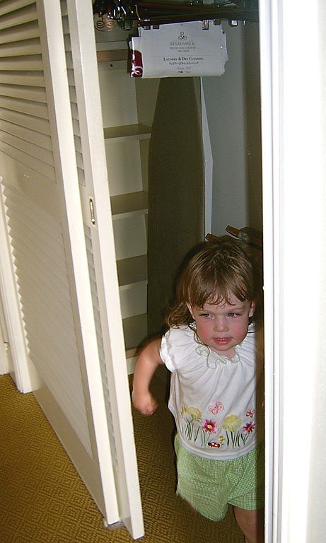 Sarah having fun running around in a different hotel room.