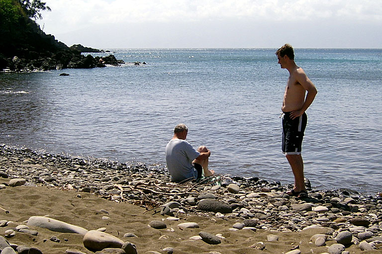 Dad and Craig cleaning off their snorkeling gear.
