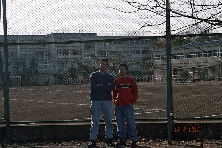 Makato and Kan in front of their old elementary school.