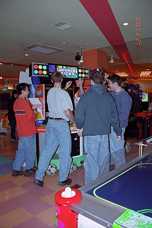 Kan, Dan, Josh, Makato, and Joel play some World Kicks. Dan and Joel celebrate a goal.