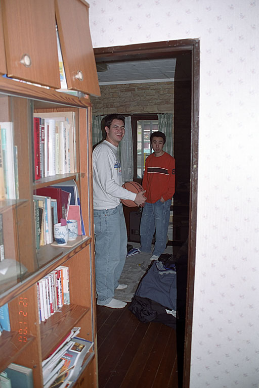 Makato and Kan clown around in Makato's room