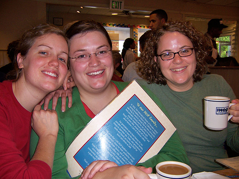 Kyann, Beth and Katy sip on some hot joe as they wait for their hot cakes.