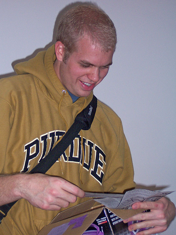 Kelby opens his gifts from home...sweet.