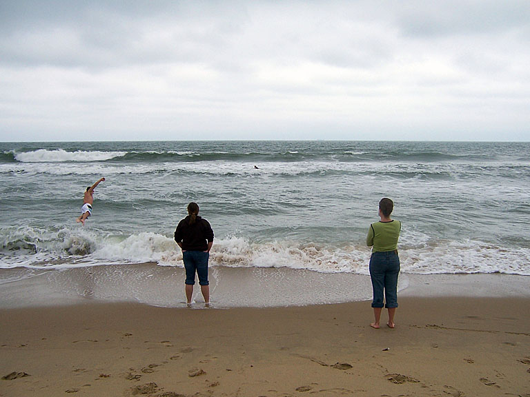 John dives in as Beth and Kyann look on.