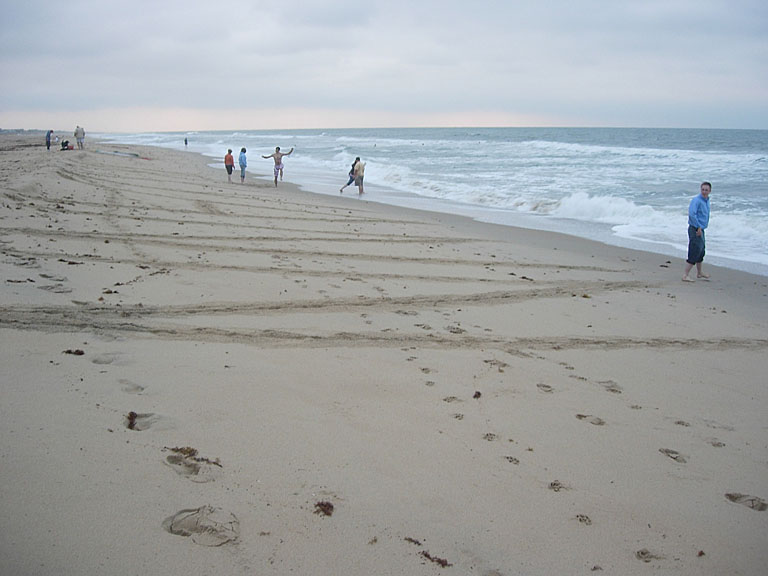 KYANN on the beach.  Everyone else is messing around.