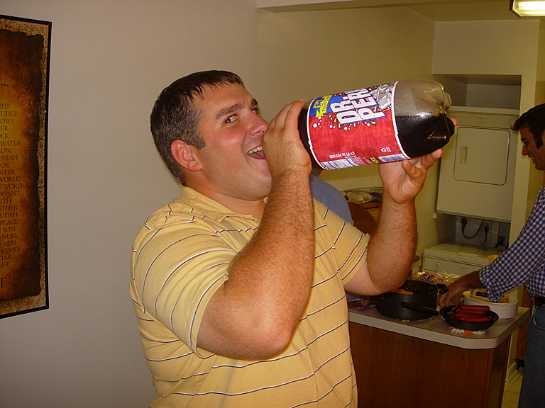 Derrick chugs from the $1 3-liter of "Dr. Perky".  Dan laughs in the background because we also had a 3-liter of "Mountain Lion."