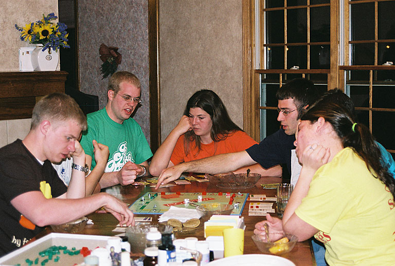 Playing Monopoly.  Jeremy, Sam, Kelby, Kami, Dan, Mark, Erica