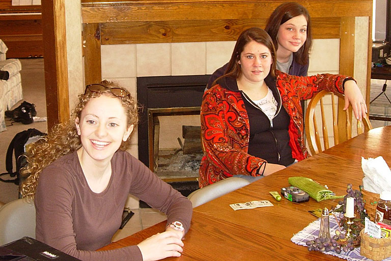 Kristi, Erica, and Kirsten waiting for the food.