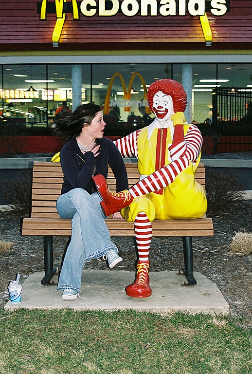 Kirsten enjoys being flattered by Ronald.