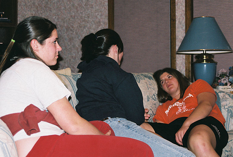 Erica, Kirsten and Kami share the sofa and conversation.
