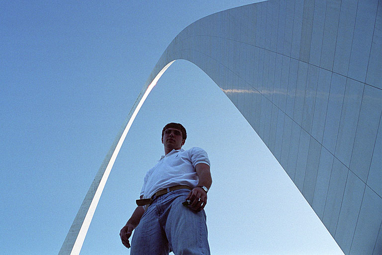 Tyler stands tall by the arch.