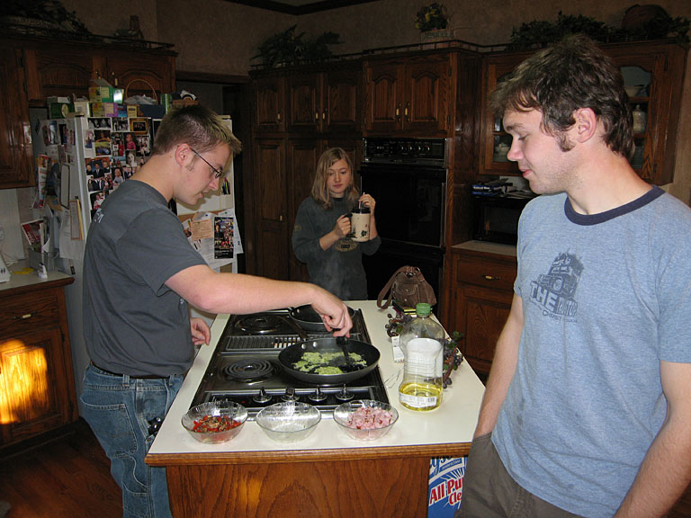Abe and Mark ready the ingredients for breakfast.  Christy is still waking up.