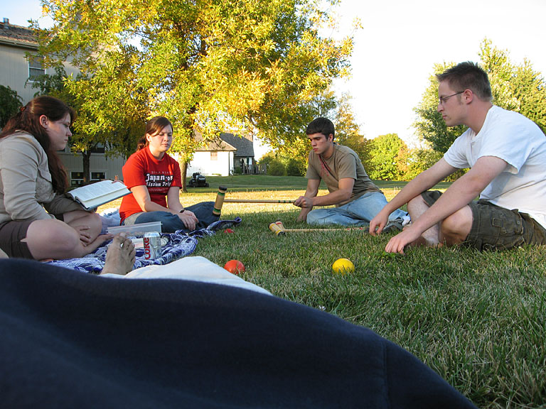 Erica, Kirsten, Kyle, and Abe relax after a hard game of croquet.