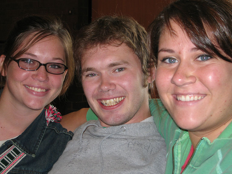 Kirsten, Mark, and Erica have a goodbye hug.