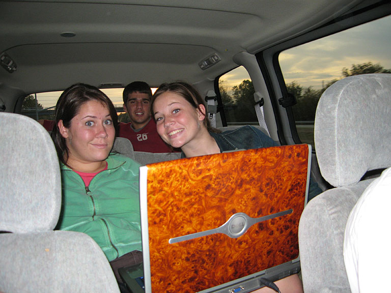 Erica, Kyle, and Kirsten watching videos on the way home.