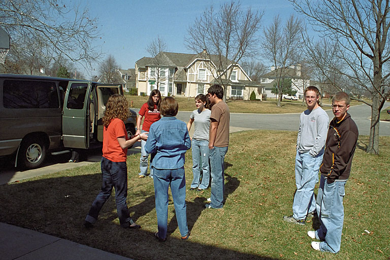 Everyone mills around not wanting to leave.