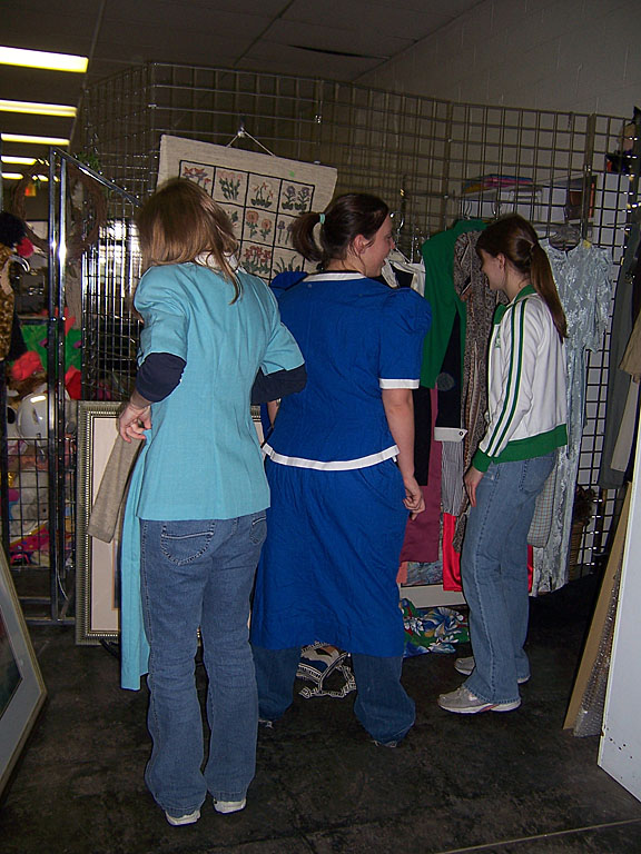 The ladies try on a few outfits.