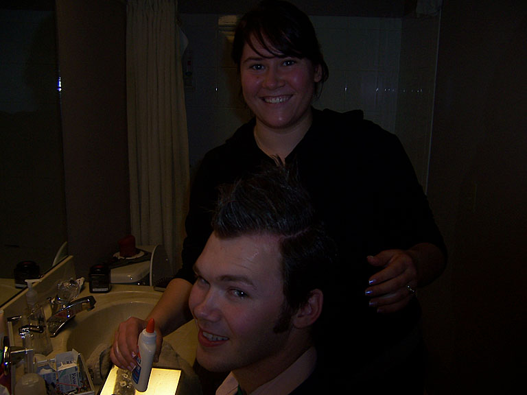 Yes, Mark is letting Erica put elmers glue in his hair.