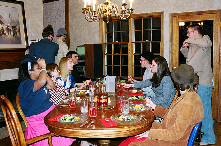 The guests in the kitchen.