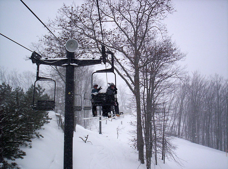 Andre and Adam Sauder riding the chair lift.