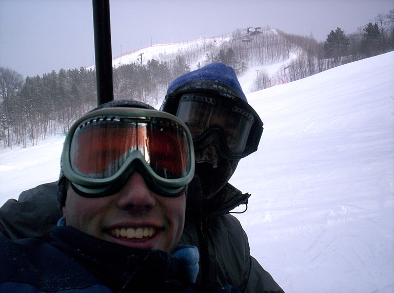 Jon Gerst and Mark Cowell ride the chair lift.