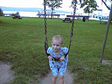 Joel agrees that anyplace that has a nice swingset and a slide that goes into the water is cool.