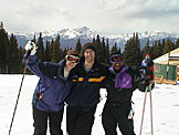 Tammy, Dan, and the old Telcordia friend take a picture to make a poster.