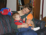 Laurie plays with Seth.  Care Bares still haven't gone out of style.