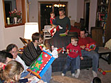 Present opening time.  Madeline, Alan, Mom, Dan, Seth, Laurie, Joel and Chad.