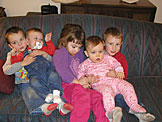 Todd, Seth, Madeline, Sarah and Todd try to all smile at the same time.