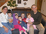Christmas at Mom and Dad's house.  Fourteen people and a whole lot of presents all under one roof.  It was the first time in quite a while that we had no snow on Christmas. It was also Sarah and Todd's first Christmas.