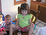 Joel and Madeline enjoy the fruit of their labor.