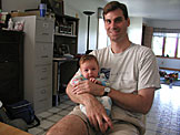 Craig hold his new nephew Seth.