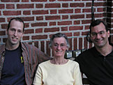 Nelson, Mom and Alan sit and wait for everyone to get ready.