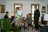 Jodie plays with Joel, while Alan looks on.  Dan and Mom play the piano while Mom gets a little help from Seth and Todd.